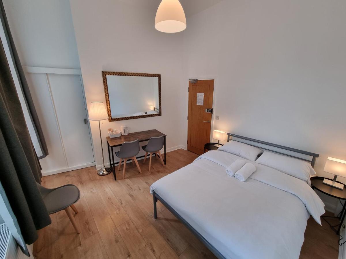 Horangee Pocha Hotel Лондон Екстериор снимка
